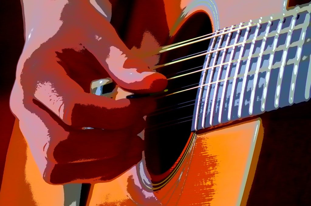 usar las púas de guitarra - aprender a tocar guitarra